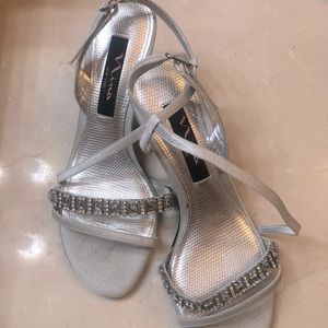 Size 6.5 strapped pumps. Cute sparkling gems